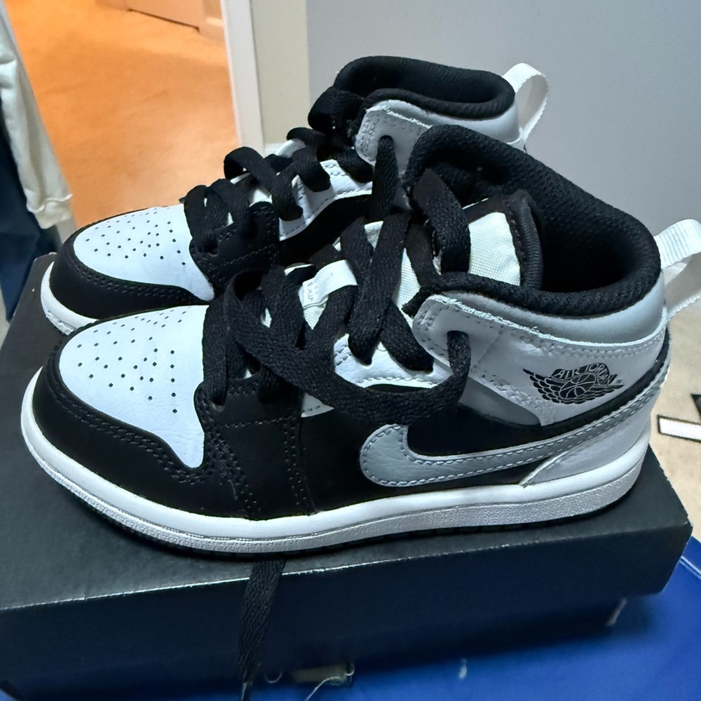 Jordan Kids Black and White High-Top Sneakers